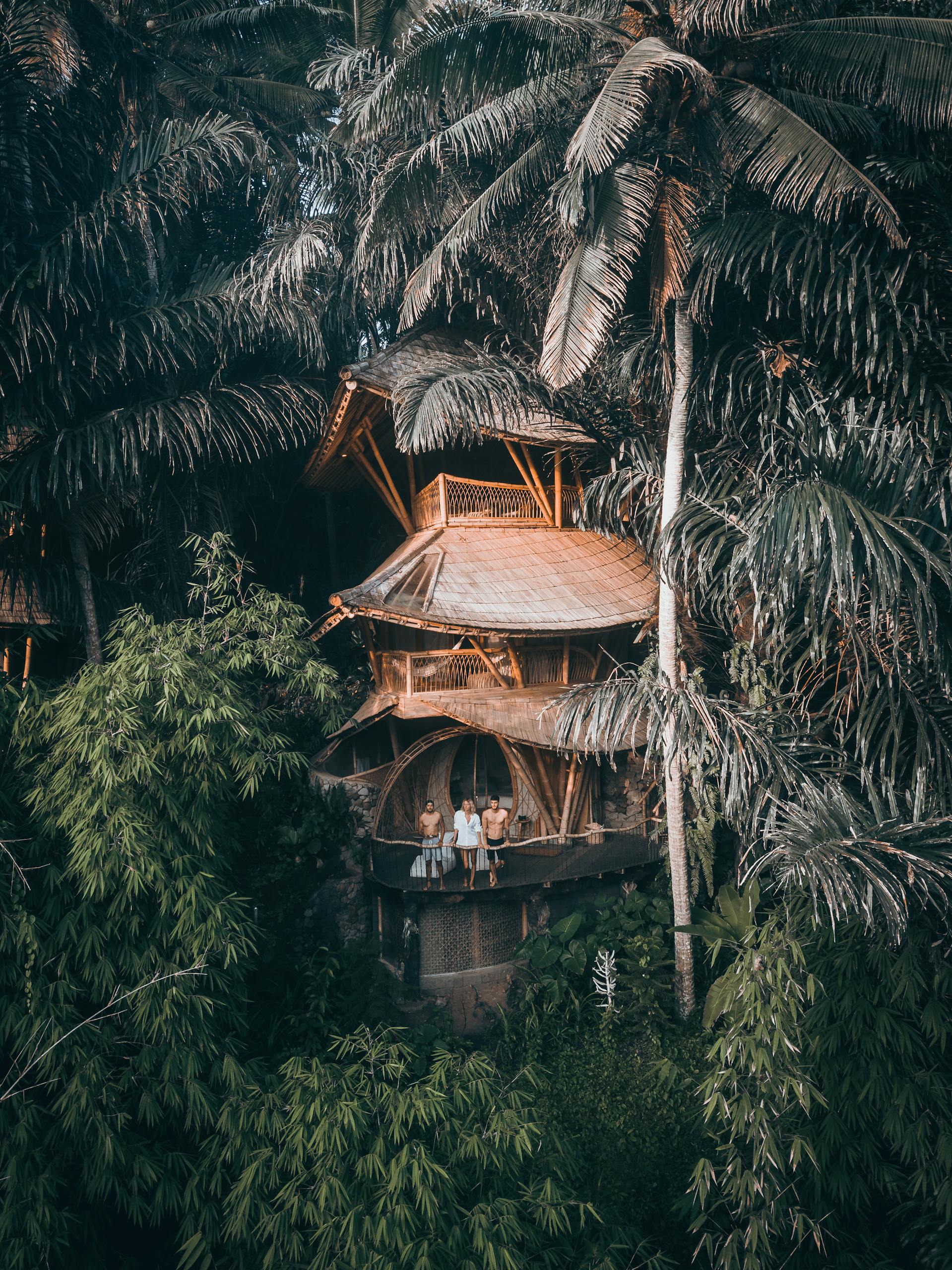 Discover serenity at a bamboo treehouse nestled amidst Bali's tropical jungle. Perfect for relaxation and nature lovers.